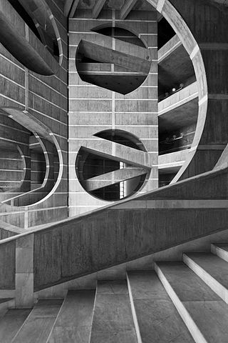 Black and white photo of interior stairways of National Assembly of Bangladesh, Dhaka, photo by Naquib Hossain