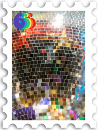 June 2024 Funky 70s SWG challenge stamp - photo of a disco ball reflecting many colors, and a number 6 in the Pride flag colors in the upper left corner