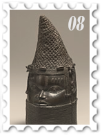 August 2024 Kings & Queens SWG challenge stamp - Brass sculpture of the head of a Benin kingdom iyoba (queen mother) wearing a cylindrical collar covering her face up to the lower lip  and a forward-pointing peaked coral-beaded crown.